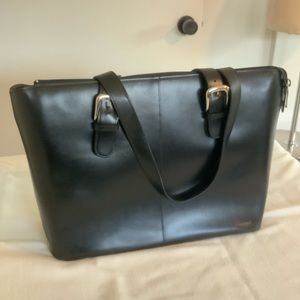 Jack George’s Briefcase in black leather.